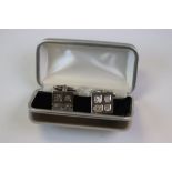 Boxed pair of modern Silver Cufflinks, the Hallmarks being part of the design