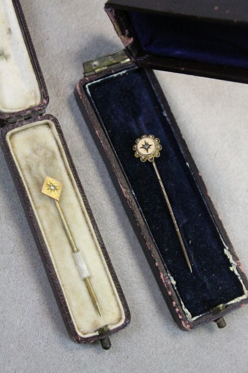 Two boxed 9ct Gold Stick Pins, both set with small Diamonds