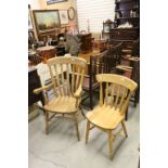 Beech and Elm Lathe Back Windsor Elbow Chair together with a matching Dining Chair