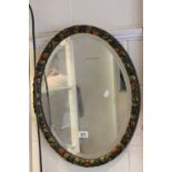 Vintage Oval Bevelled Edge Mirror with a Moulded Frame in the form of Fruits and Foliage, 56cms