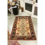 Red and Cream Ground Wool Rug with Multi-coloured Pattern, 160cms x 106cms