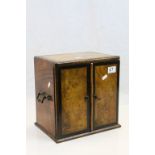 19th century Walnut Tantalus Cabinet, the two hinged doors opening to reveal a pull-out drawer