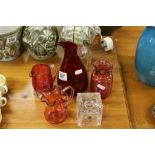 Whitefriars Red Glass Vases, Two Cranberry Glass Jugs and a Vase plus Glass Candle Holder