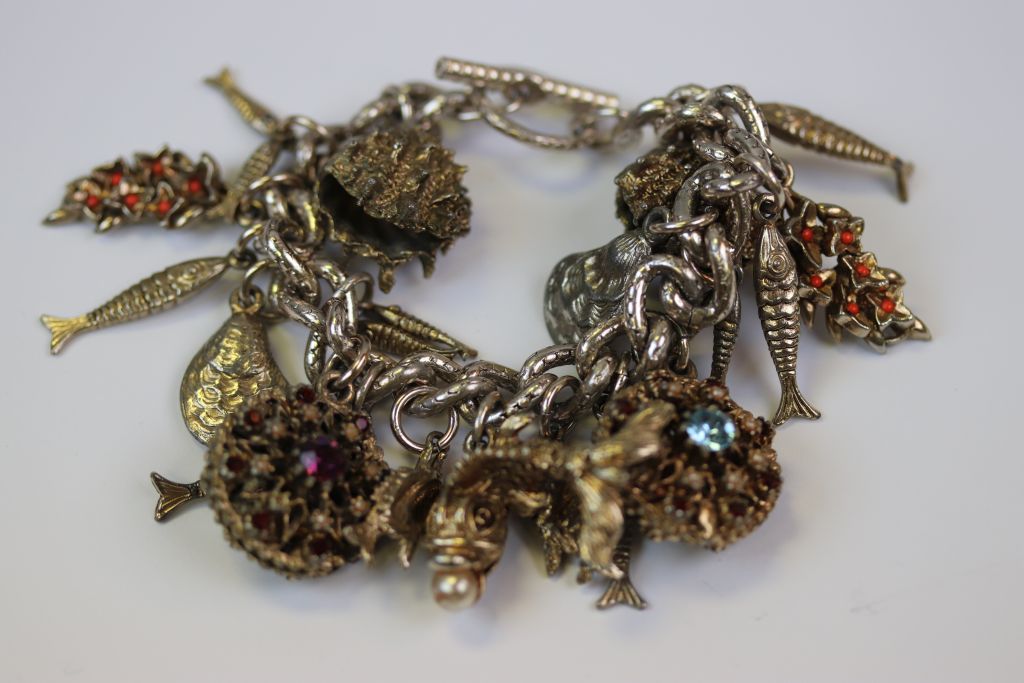 White metal Costume jewellery Charm bracelet with mainly Sea themed Charms