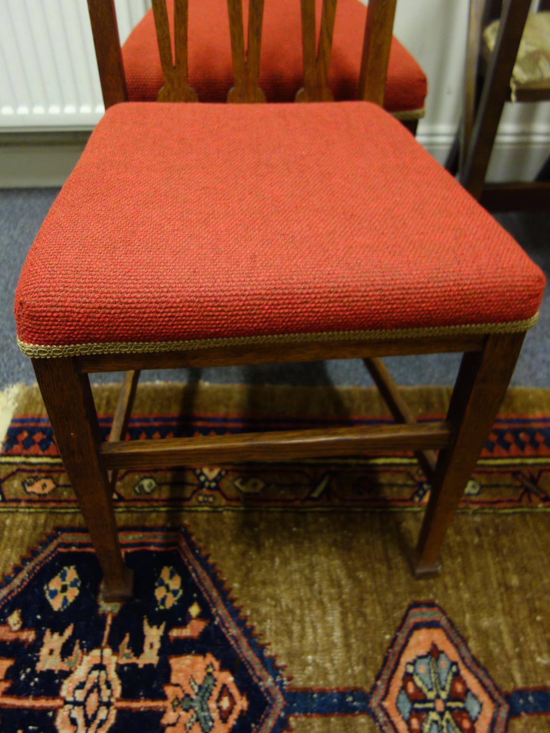 Pair of oak Art Nouveau chairs with inlaid decoration to the back, burgundy upholstered - Image 3 of 3