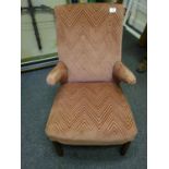 Salmon upholstered Edwardian open armchair