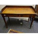 Mahogany Victorian period galleried writing desk, 2 short drawers to the front on turned supports,