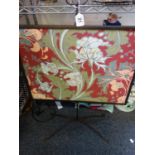 Arts & Crafts fire screen with graduating height mechanism, inset decoration to the centre 23" x 19"