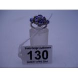 Tanzanite and diamond Ladies ring on white gold, floral style decoration to the top size M est 70-