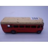 Tin plate push and pull London Coach, makers Tri-ang, 7" long 2.5" tall in a played condition,