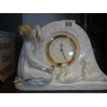 Lladro a rare and collectable decorative arched topped mantle clock with quartz movement, the