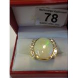 Stunning large Opal and Diamond ring, total weight 68 grams marked 750 18 ct gold contains a large