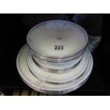 Un-used with original price tags Royal Doulton 4 place setting dinner service, patter Carnation,