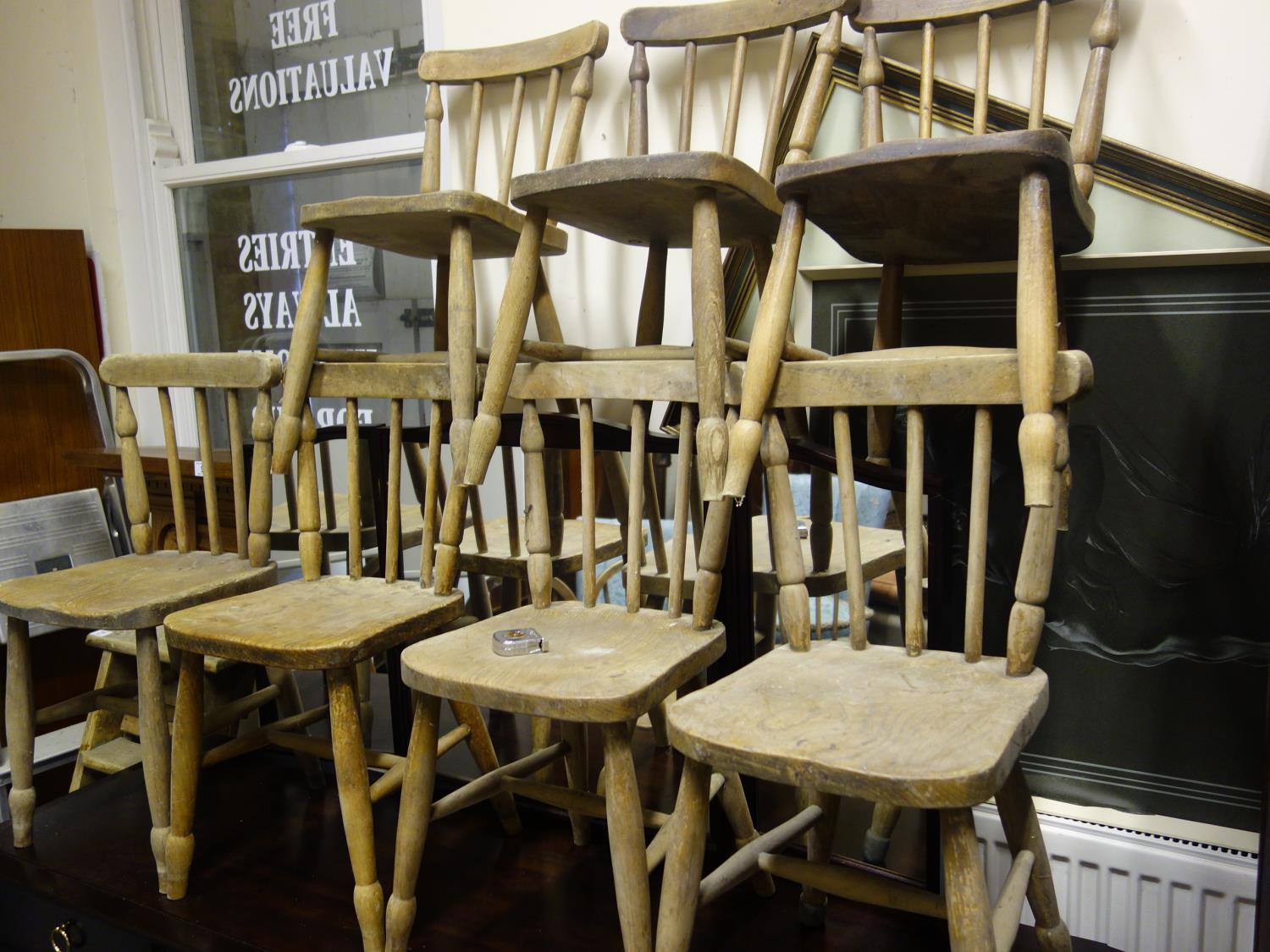 Vintage pine and elm children's nursery chairs, 7 in total, each one with a spoke back, matching set