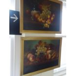 Pair of still life oil paintings on canvas in gilt mounts, each one 20" x 24" one with minor
