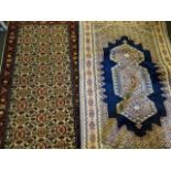 2 x rugs including a 168cm x 97cm Pakistan hand knotted carpet, modern, predominately blue, and 1