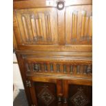 Good quality oak antique style cocktail cabinet, the base unit has double doors and a single long