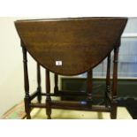 Oval topped gate leg table, with spider legs