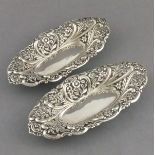 A pair of boat shaped Bon Bon dishes, Birmingham 1893, with pierced and foliate decoration, 8.5" x
