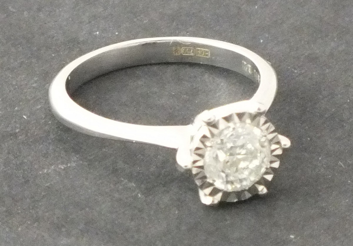 A solitaire diamond ring, the stone approx 0.9ct, 3.7g, together with a European Diamond Reports