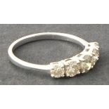 A five stone diamond ring, claw set within 18ct white gold, 2.4g