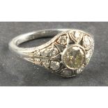 A diamond dress ring, the central stone approx 0.8ct within graduated stones to the flanks, 4.6g