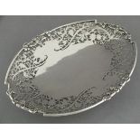 A silver grape dish, Cooper Bros., Sheffield 1964, of oval form, with a fancy pierced border