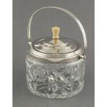 A silver mounted cut glass biscuit barrel C.W. Fletcher, Sheffield 1936, in the Art Deco manner,