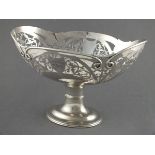 A silver pedestal fruit bowl, Daniel George Collins, of oval form with a pierced border, 8" high (