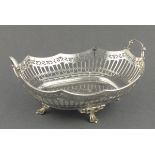 A silver rectangular twin handled bread basket  Atkin Bros., Sheffield 1926, pierced with foliage