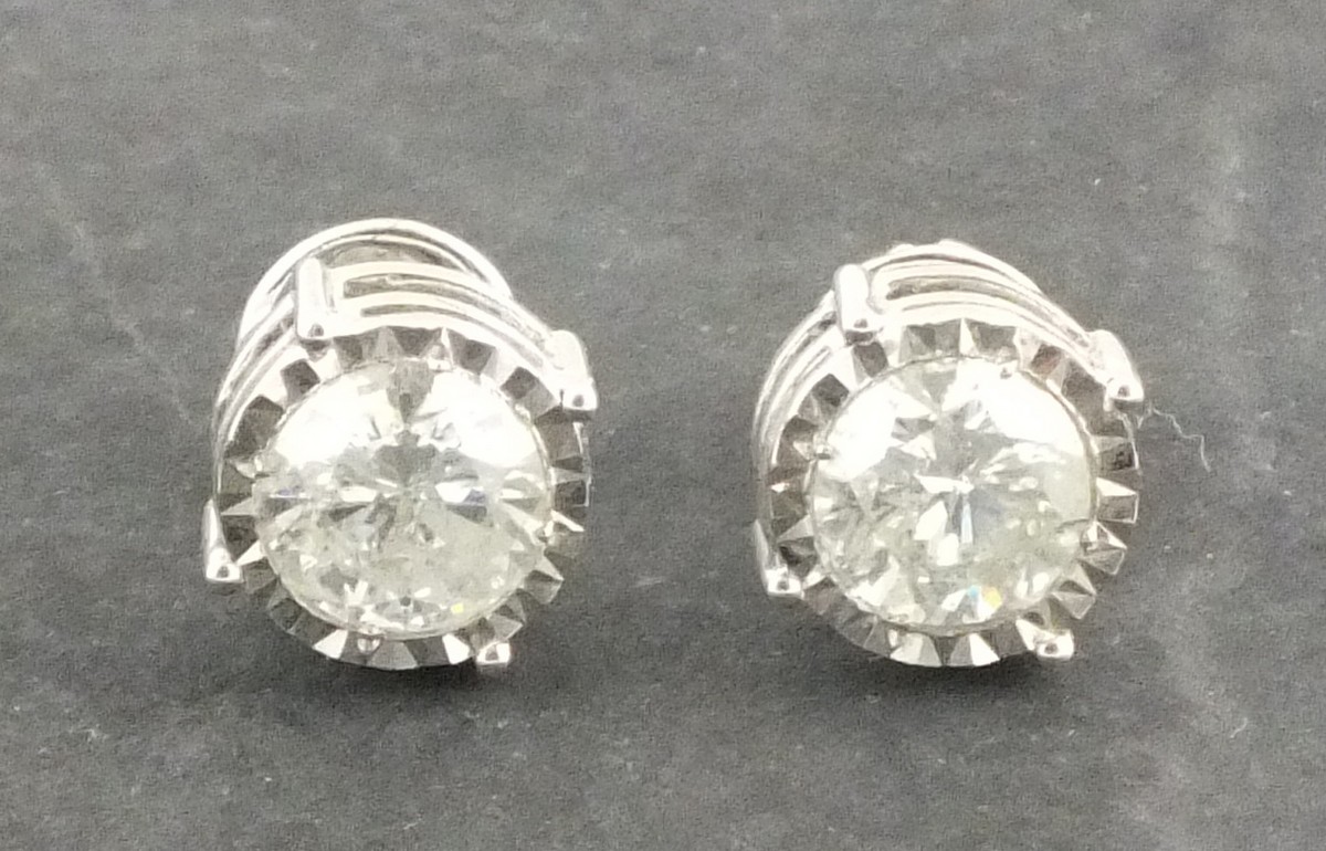 A pair of diamond ear studs, approx 2.17ct, set in 18ct white gold, 4.9g