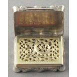 A rectangular silver vinigrette, Birmingham 1859 - Edward Smith, the shaped box with engine