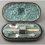 A late Victorian silver christening set, Birmingham 1900, foliate engraved with vacant cartouches,