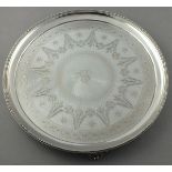 A Victorian silver salver, Birmingham 1887 - Fredrick Elkington, of circular form with bright-cut