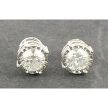 A pair of diamond ear studs, approx 2.17ct, set in 18ct white gold, 4.9g