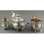 A George III silver three piece tea service, London 1814 - Stephen Adams, of oblong form and