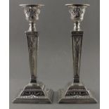 A pair silver neo-classical style candlesticks, London 1967, of square tapering form with drapery