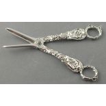 A pair of Victorian silver grape scissors, London 1870 - Francis Higgins, the cast handles decorated