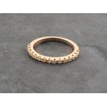 A half hoop eternity ring, set in 9ct yellow gold, 0.5g