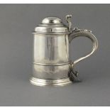 A Georgian silver lidded tankard, London 1733, John Fossey, the domed cover above straight