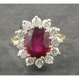 JEWELLERY A ruby and diamond dress ring, the fine Burmese oval cut ruby 4.5ct set within a band of