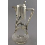 A white metal mounted claret jug, Austrian circa 1905, Herman Suedfield, the sinuous mount bearing