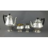 A silver four piece coffee and tea service, Sheffield 1912, Richard Martin & Ebenezer Hall, of plain