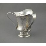 A silver Arts and Crafts tyg jug, Birmingham 1908, Thomas Edward Atkins, planished decoration and