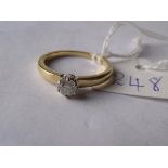 Gold ring mounted with a diamond solitaire. Approx size 'L'