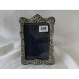 Photo frame with embossed border. 6 ½ in high Birm 1903