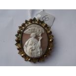 Gilt metal framed shell cameo brooch of lady feeding eagle 2" long