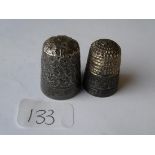 Two silver thimbles
