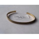 A high carat gold hair bangle