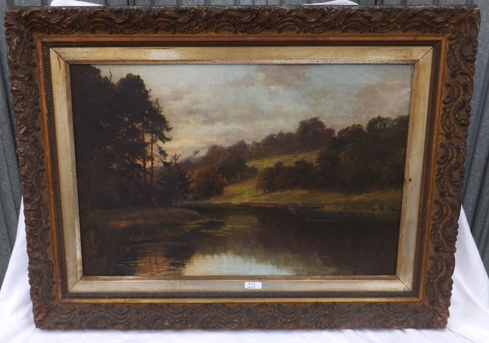WALTER W. GODDARD – Figures in boat in river landscape – 16 x 23. Signed